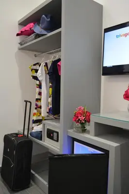 a walk in closet with a desk and a computer monitor at Room 91-S. Peter in Rome
