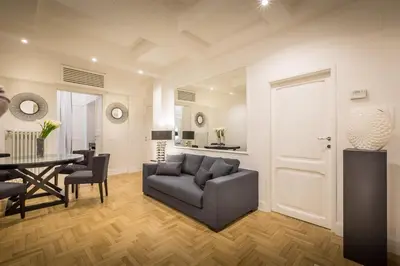 a living room with a couch and a table at Old Town Apartments Rome in Rome
