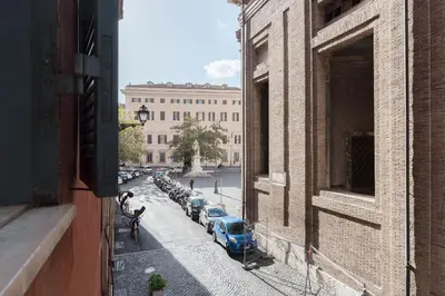 a view of a street with parked cars from a building at Casa dell'Arco - WelcomeToRhome in Rome