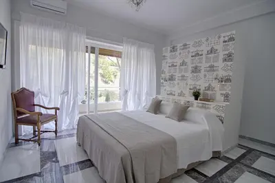 a living room with a couch and a table at Vatican Park Residence in Rome