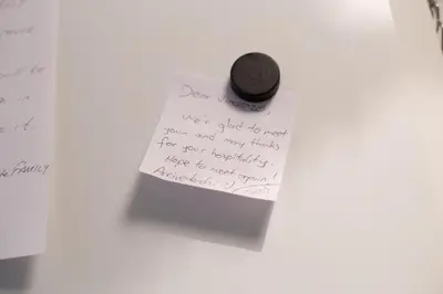 a piece of paper with a pen on top of it at Oscar Rooms in Rome