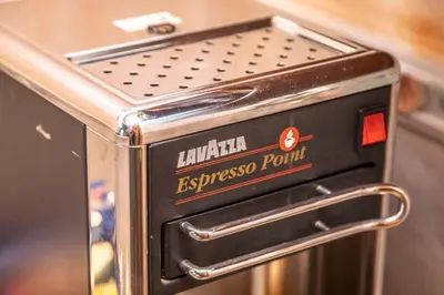 a toaster oven with the words lukla espresso point at Hotel Barrett in Rome
