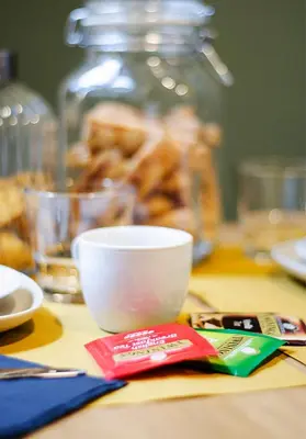 a table with a cup and a bowl on it at Eterna Roma in Rome