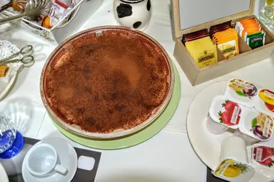 a chocolate pie sitting on a table with a plate at Santa Maria Maggiore in Rome