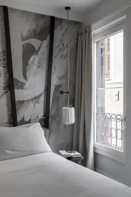 a bedroom with a bed and a window at BDB Rooms Navona in Rome