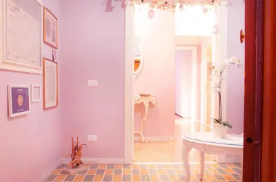 a bathroom with a white sink and a mirror at Ninuphar Maison - alloggio per uso turistico in Rome