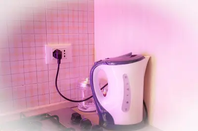 a blender sitting on a counter next to a lightswitch at Ninuphar Maison - alloggio per uso turistico in Rome