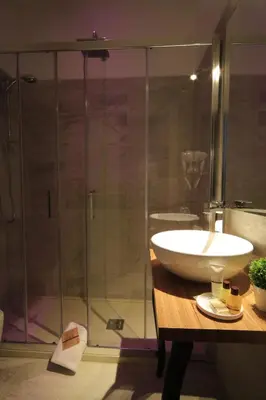 a bathroom with a sink and a shower at K Rooms in Rome