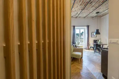 a kitchen with a sink and a stove at EVE Penthouse Colosseo in Rome