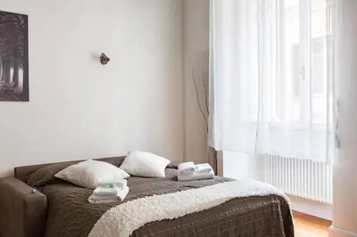 a bedroom with a bed with towels on it at Campo Marzio Boutique in Rome