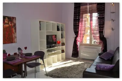 a living room with a couch and a table at Valentina Vatican Apartment in Rome