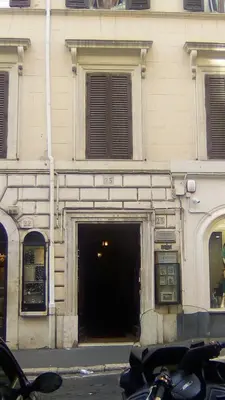 a building with a door into a dark tunnel at Excellent Trinity Rooms in Rome