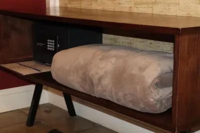 an elephant pillow sitting on a shelf at Residenza Roma Imperiale in Rome