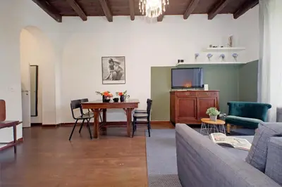 a living room with a couch and a table at Tevere apartments in Rome