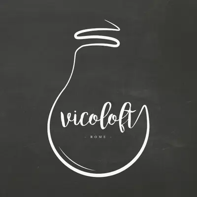 a chalk drawing of a bird on a blackboard at Vicoloft Vicolo in Rome
