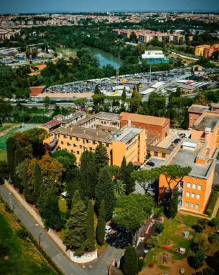 an overhead view of a city with buildings and trees at Phi Hotel Garden Area Roma Eur in Rome