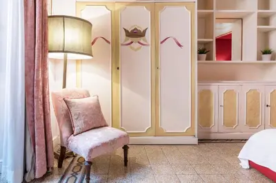 a living room with a couch and a table at Piazza Colonna Apartment - Charme Holidays in Rome