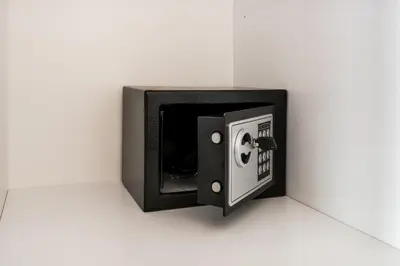 a small safe is attached to a wall at Expeditus VATICAN Luxury Suites SAINT PETER'S VIEW in Rome