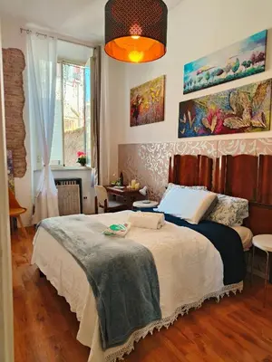 a bedroom with a large bed in a room at Marii Piazza Navona in Rome