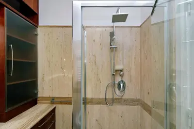 a shower with a glass door in a bathroom at Pantheon Family Junior Suite in Rome