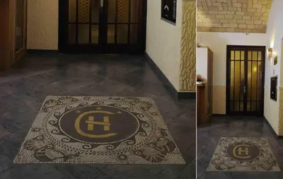 two pictures of a rug on the floor of a hallway at Hotel Campidoglio in Rome