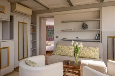 a living room with a couch and a table at Lf View in Rome