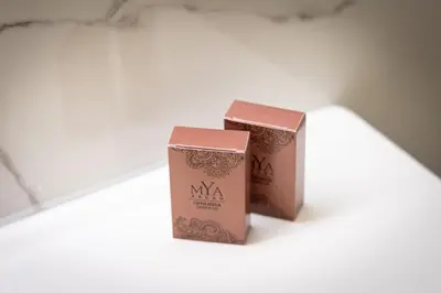two boxes sitting on top of a table at Rental in Rome - Bramante Luxury in Rome