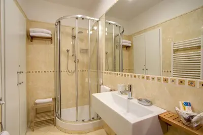 a bathroom with a sink and a shower at PapavistaRelais in Rome