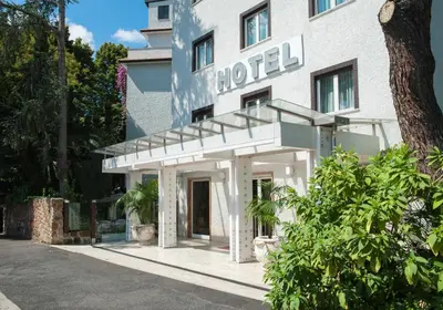 a hotel with a sign on the front of it at Hotel La Pergola in Rome