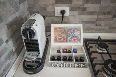a blender sitting on a counter next to a stove at Guest House Vignola in Rome