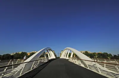 a bridge over a road with a blue sky at Guest House Vignola in Rome