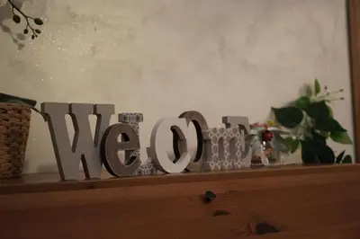 a wooden sign sitting on top of a shelf at Le Quattro Meraviglie in Rome