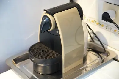 a coffee maker sitting on top of a sink at HT Residence Maximus in Rome