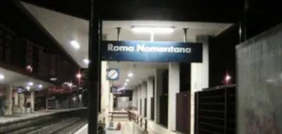 a train station with a sign that says roma convention at Casa Dino rooms in Rome