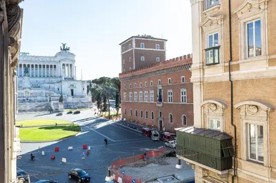 a view of a street in a city with buildings at Amazing Piazza Venezia Suites in Rome