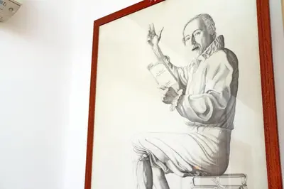 a drawing of a man holding a book at Sonnino Suite in Rome