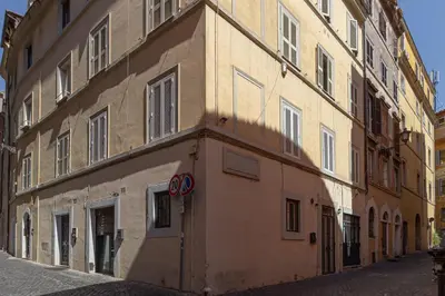 a large building on the side of a street at Harry's Bar Trevi Luxury Apartments - Modelli in Rome