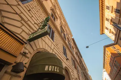 a hotel sign on the side of a building at Hotel Giorgina in Rome