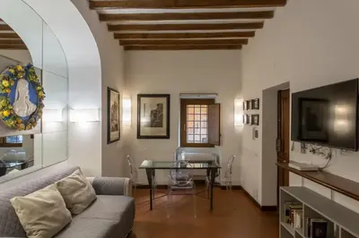 a living room with a couch and a table at Navona apartment in Rome