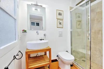 a bathroom with a sink and a shower at Sistina in Rome