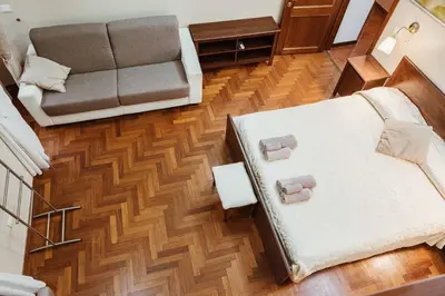 an overhead view of a living room with a couch at Ronda St. Angelo Suites in Rome