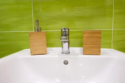 a bathroom sink with a faucet on top of it at Ottaviano Exclusive Maison in Rome