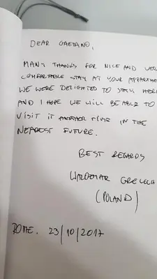 a piece of paper with handwriting on it at Ottaviano Exclusive Maison in Rome