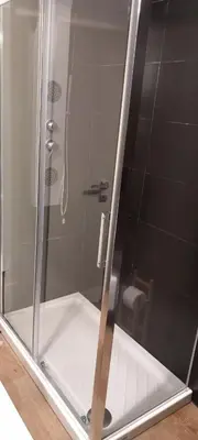 a glass shower with a toilet in a bathroom at Rome Unique Monti Colosseum in Rome