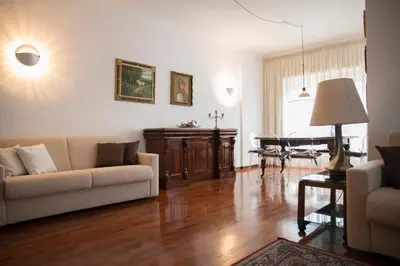 a living room with a couch and a table at Plumbird Boutique & Apartment in Rome