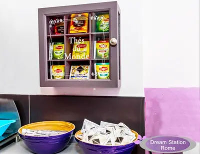 a cabinet with food inside of it with two bowls of food at Dream Station in Rome
