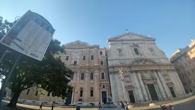 a large building with a sign in front of it at Dreaming Navona Rooms in Rome