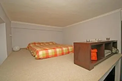 a kitchen with a table and chairs in a room at Happy House Rienzo in Rome