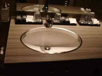 a white sink with a faucet in a bathroom at Morrisson Exclusive Rooms in Rome