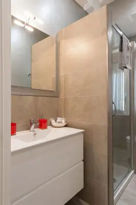 a bathroom with a sink and a shower at M&M House in Rome